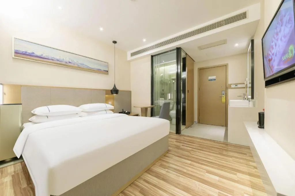Bed in City Comfort Inn Wuhan Xudong Street Wangjiadun Metro Station