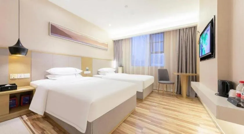 Bed in City Comfort Inn Wuhan Xudong Street Wangjiadun Metro Station