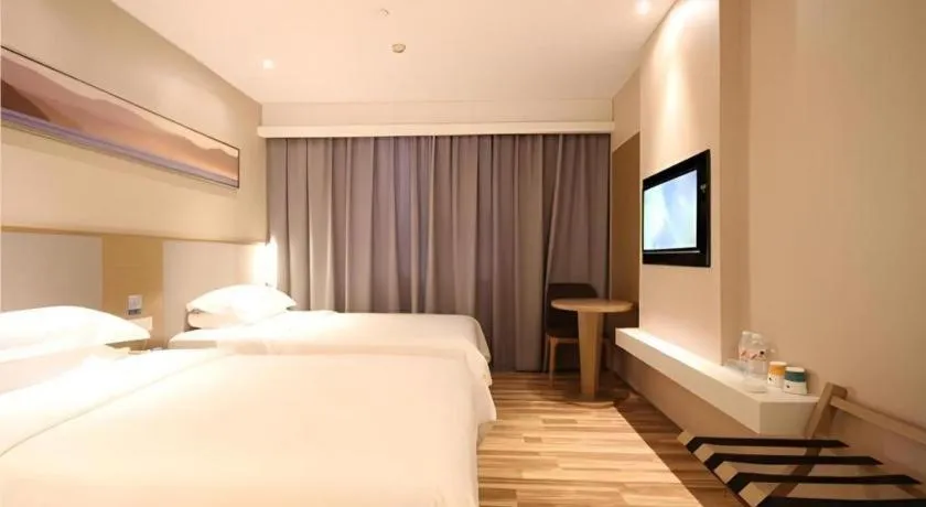 Bed in City Comfort Inn Wuhan Xudong Street Wangjiadun Metro Station