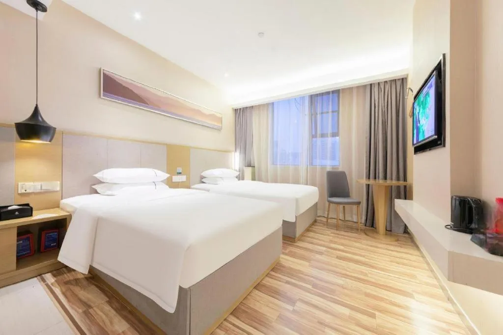 Bed in City Comfort Inn Wuhan Xudong Street Wangjiadun Metro Station