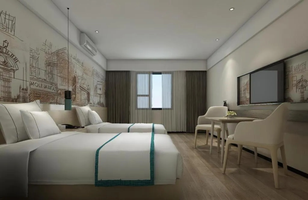 Bed in City Comfort Inn Guangzhou Shisanhang Shachong Metro Station