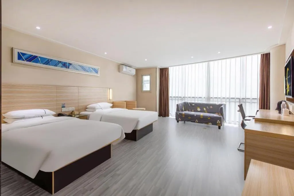 Bed in City Comfort Inn Wuhan Fengshu Er Road Baijin Mansion