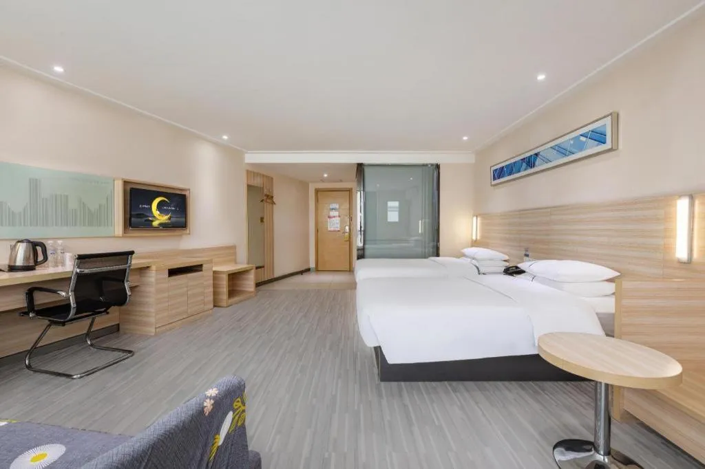 Bed in City Comfort Inn Wuhan Fengshu Er Road Baijin Mansion