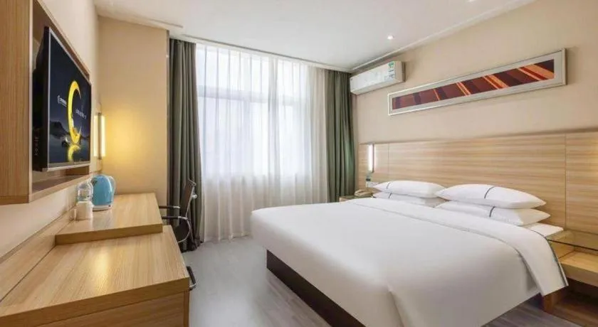 Bed in City Comfort Inn Wuhan Fengshu Er Road Baijin Mansion
