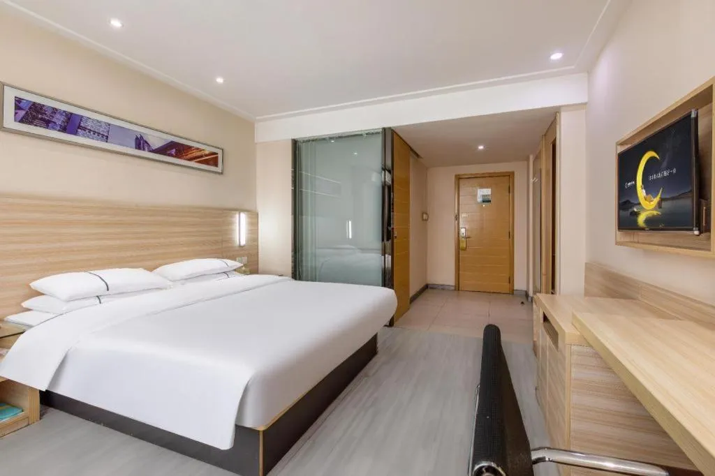 Bed in City Comfort Inn Wuhan Fengshu Er Road Baijin Mansion