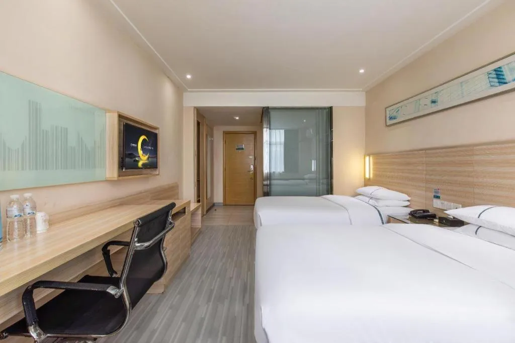 Bed in City Comfort Inn Wuhan Fengshu Er Road Baijin Mansion