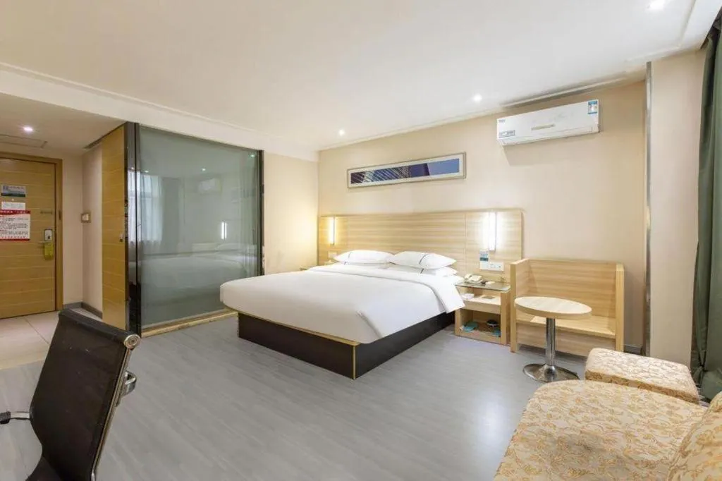 Bed in City Comfort Inn Wuhan Fengshu Er Road Baijin Mansion