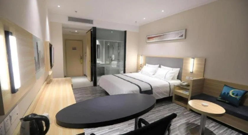 Bed in City Comfort Inn Zhongshan Nanqu Subdistrict Yong'an Square