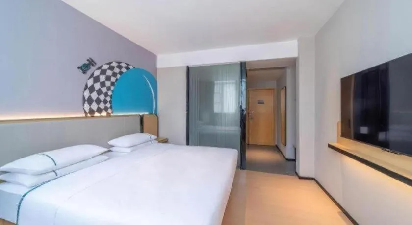 Bed in City Comfort Inn Zhongshan Nanqu Subdistrict Yong'an Square