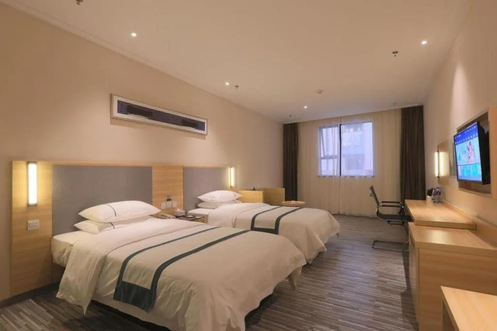 Bed in City Comfort Inn Zhongshan Nanqu Subdistrict Yong'an Square