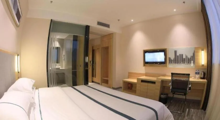 Bed in City Comfort Inn Zhongshan Nanqu Subdistrict Yong'an Square