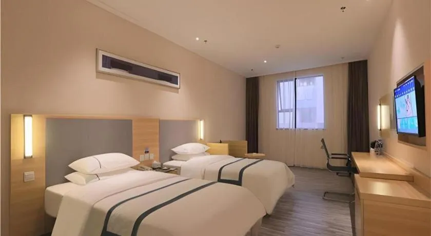 Bed in City Comfort Inn Zhongshan Nanqu Subdistrict Yong'an Square