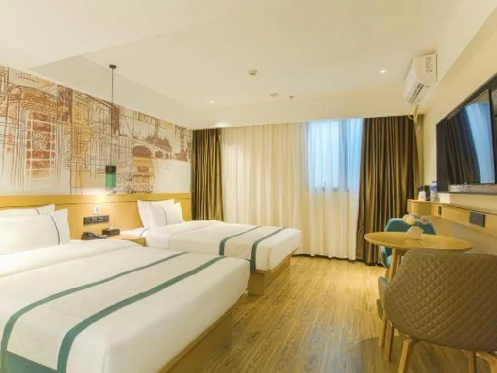 Bed in City Comfort Inn Wuhan Optics Valley OuYada Yangjiawan Metro Station