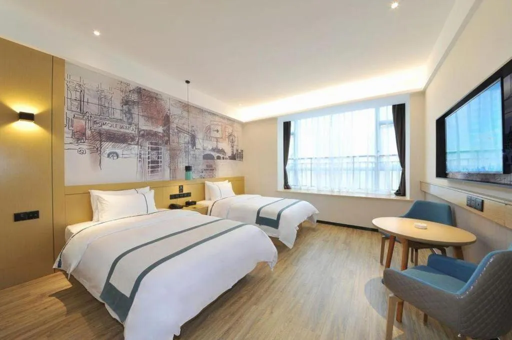 Bed in City Comfort Inn Chengdu Wenjiang University Town Fengxi River Metro Station