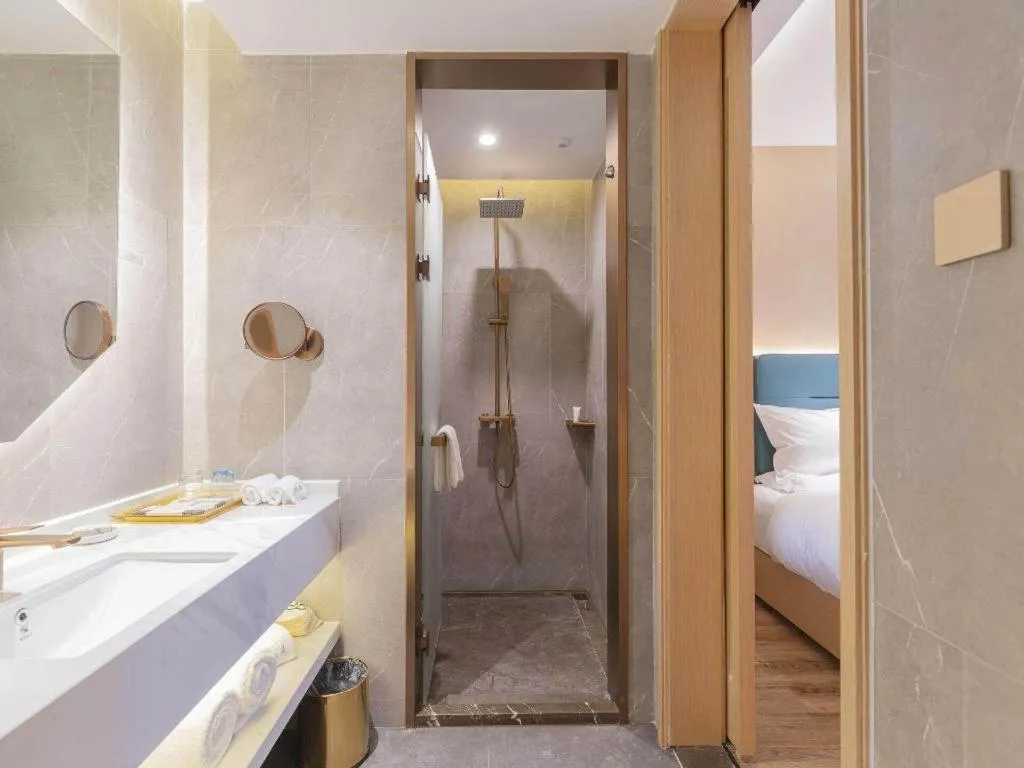 Bed in ZMAX Hotels Shenzhen Lianhuacun Metro Station