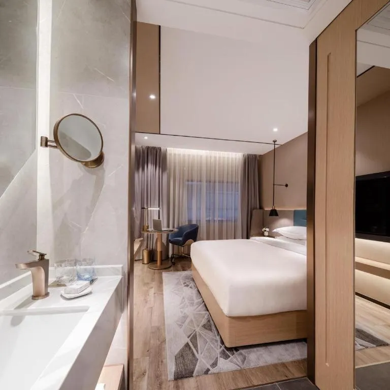 Bed in ZMAX Hotels Shenzhen Lianhuacun Metro Station