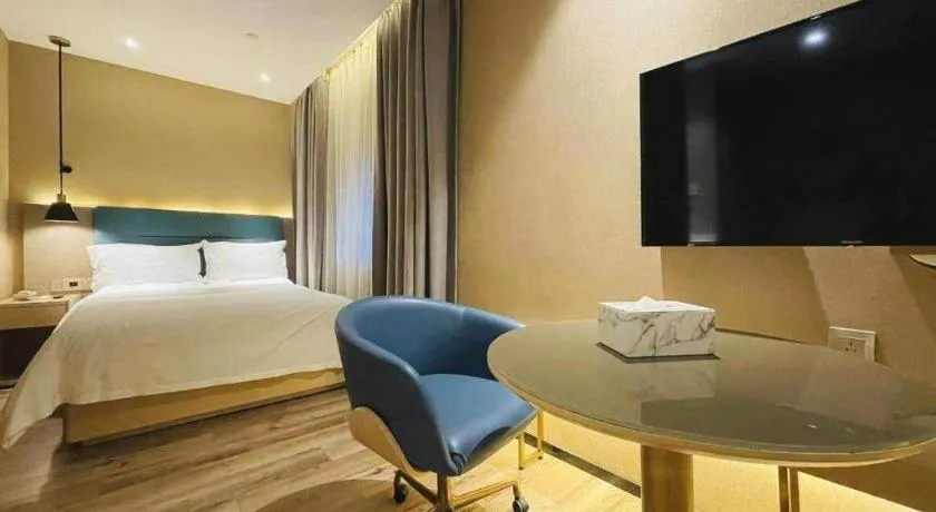 Bed in ZMAX Hotels Shenzhen Lianhuacun Metro Station