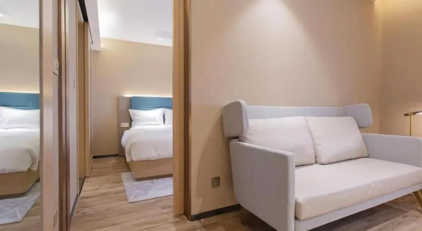 Bed in ZMAX Hotels Shenzhen Lianhuacun Metro Station