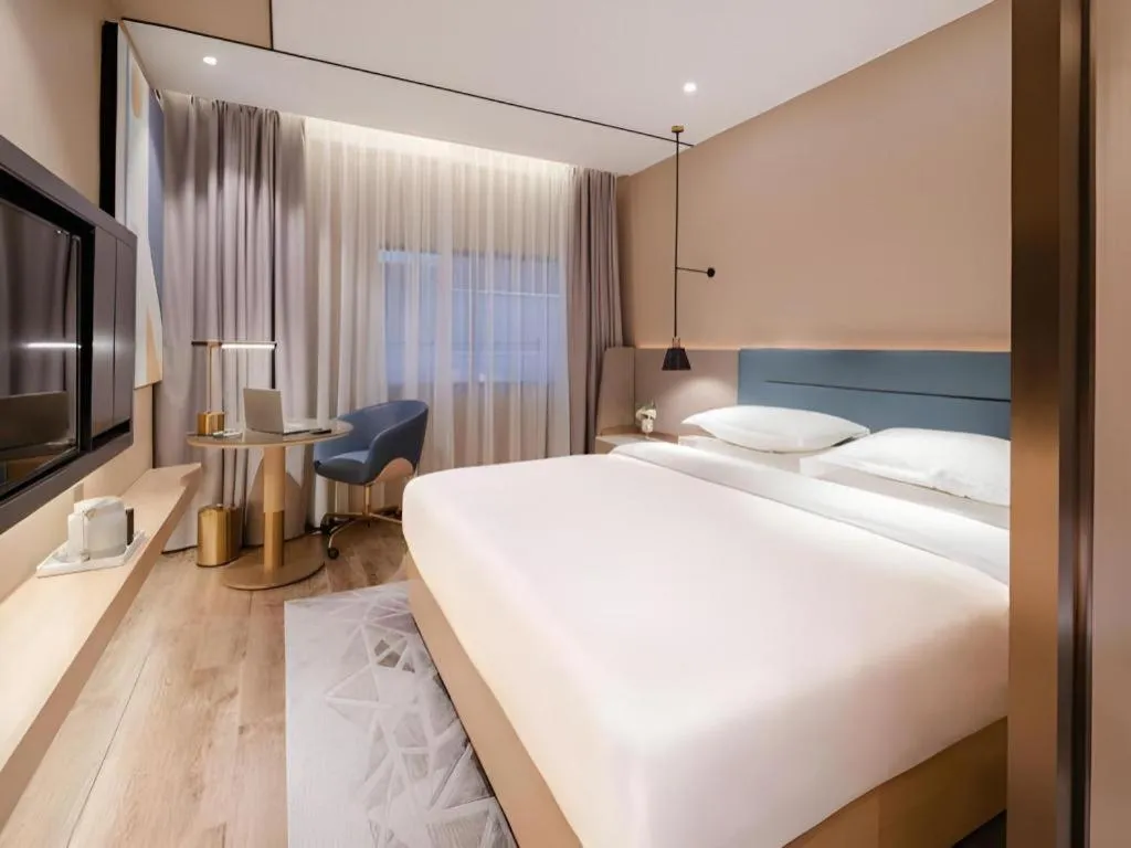 Bed in ZMAX Hotels Shenzhen Lianhuacun Metro Station