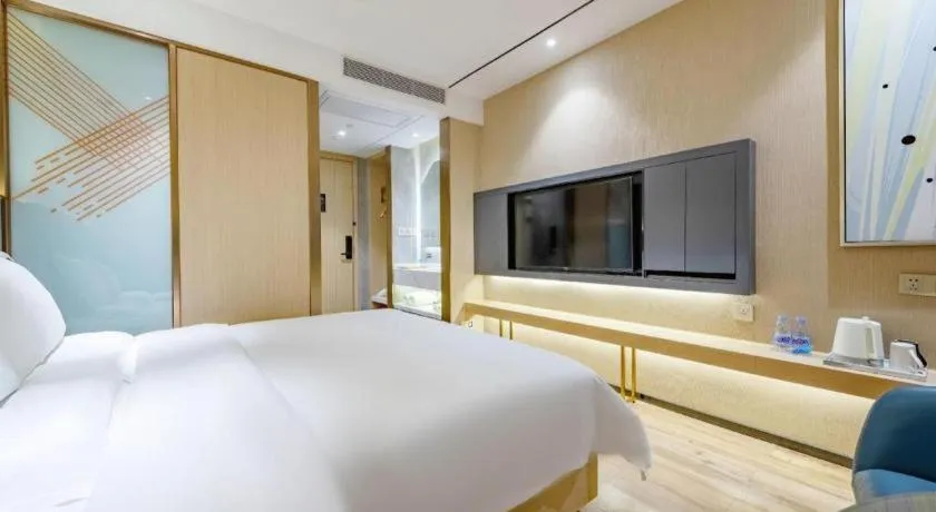 Bed in ZMAX Hotels Shenzhen Lianhuacun Metro Station