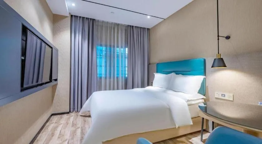 Bed in ZMAX Hotels Shenzhen Lianhuacun Metro Station