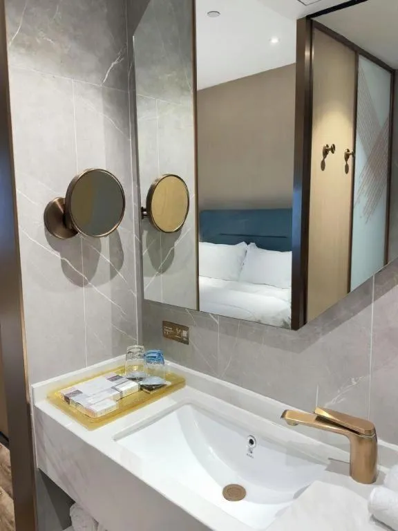 Bed in ZMAX Hotels Shenzhen Lianhuacun Metro Station