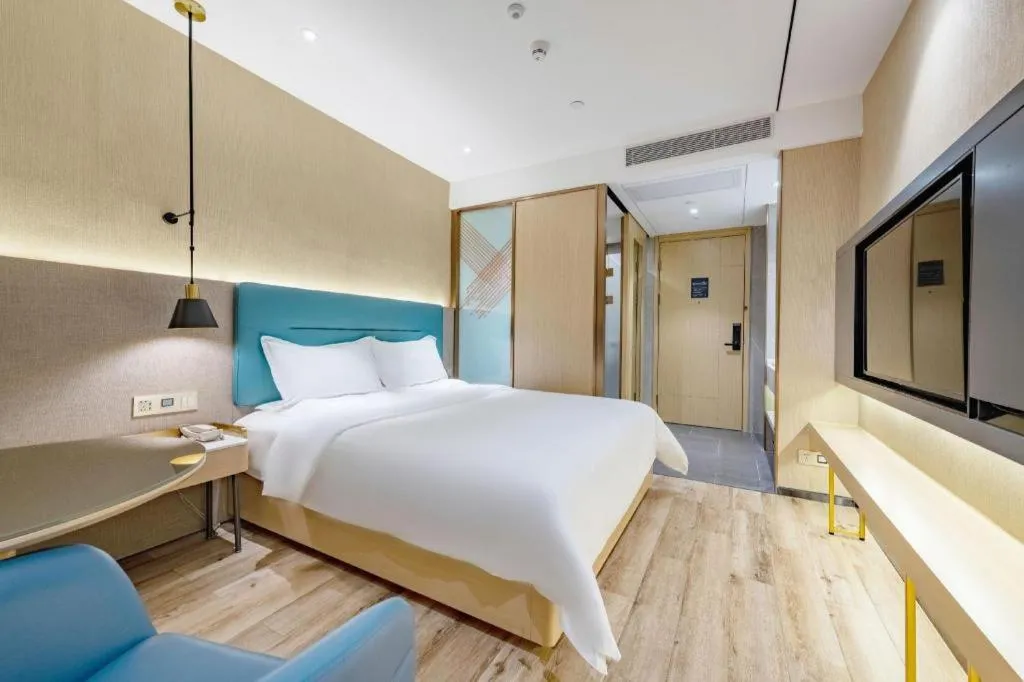 Bed in ZMAX Hotels Shenzhen Lianhuacun Metro Station