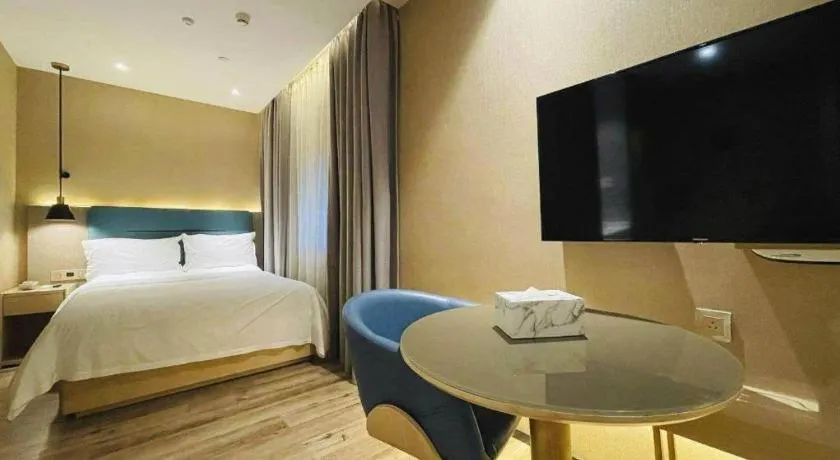 Bed in ZMAX Hotels Shenzhen Lianhuacun Metro Station