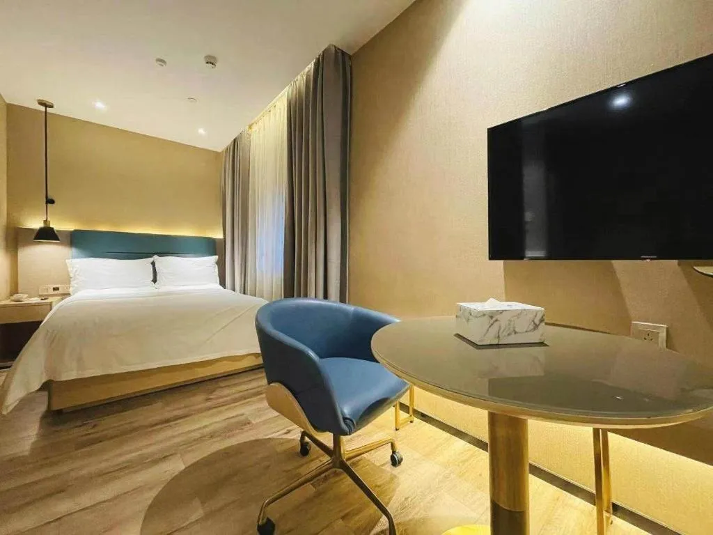 Bed in ZMAX Hotels Shenzhen Lianhuacun Metro Station