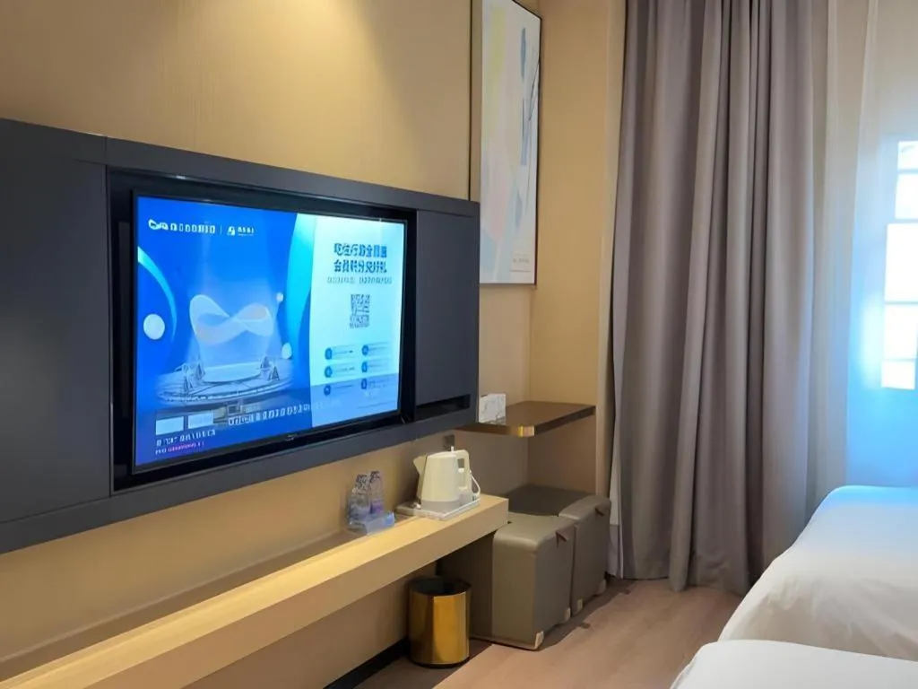 Bed in ZMAX Hotels Shenzhen Lianhuacun Metro Station