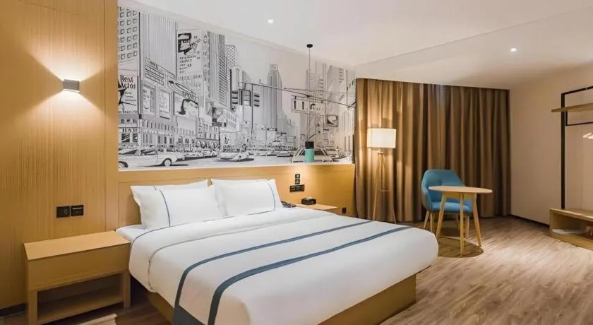 Bed in City Comfort Inn Dongguan Wangniudun