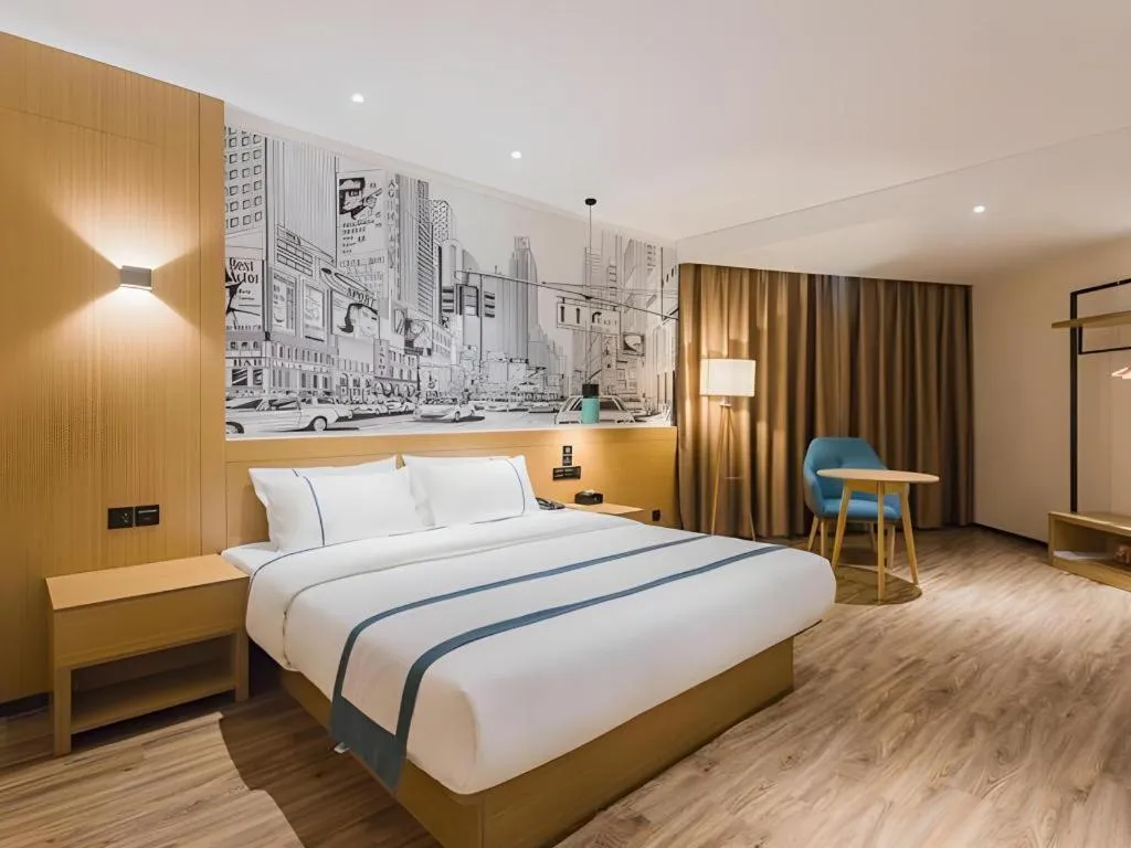 Bed in City Comfort Inn Dongguan Wangniudun
