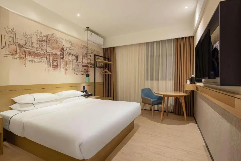 Bed in City Comfort Inn Dongguan Wangniudun
