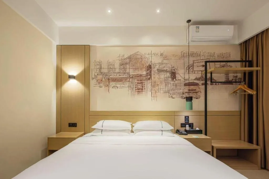 Bed in City Comfort Inn Dongguan Wangniudun