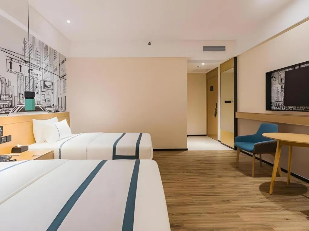 Bed in City Comfort Inn Dongguan Wangniudun