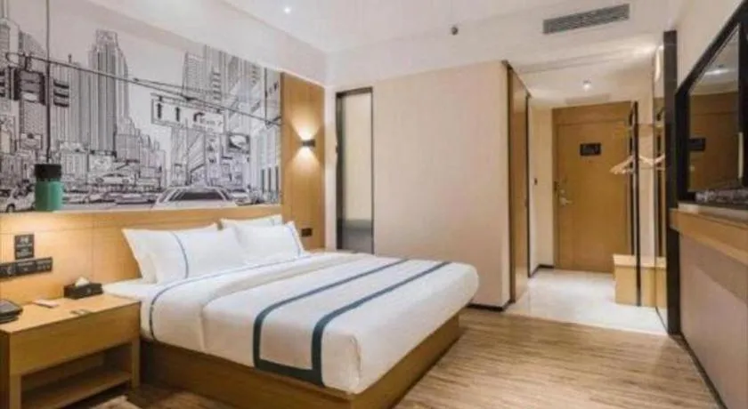 Bed in City Comfort Inn Dongguan Wangniudun