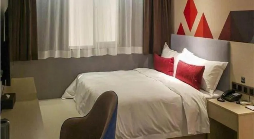 Bed in Borrman Hotel Dongguan Houjie Wanda Plaza Liaoxia Metro Station