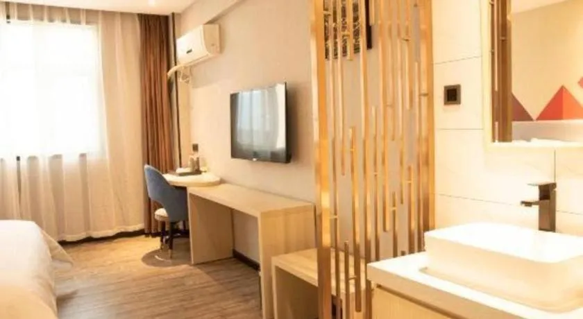 Bed in Borrman Hotel Dongguan Houjie Wanda Plaza Liaoxia Metro Station