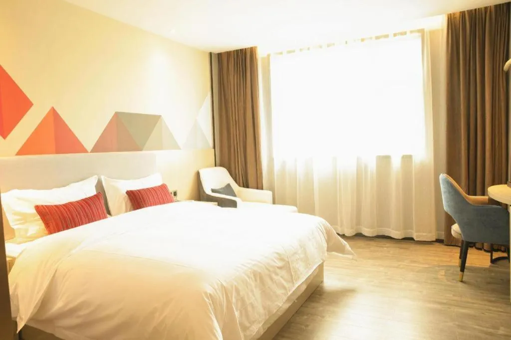 Bed in Borrman Hotel Dongguan Houjie Wanda Plaza Liaoxia Metro Station