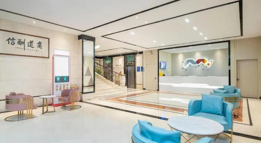 Bed in Borrman Hotel Dongguan Houjie Wanda Plaza Liaoxia Metro Station