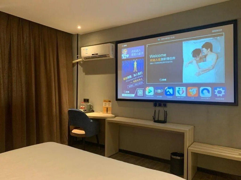 Bed in Borrman Hotel Dongguan Houjie Wanda Plaza Liaoxia Metro Station