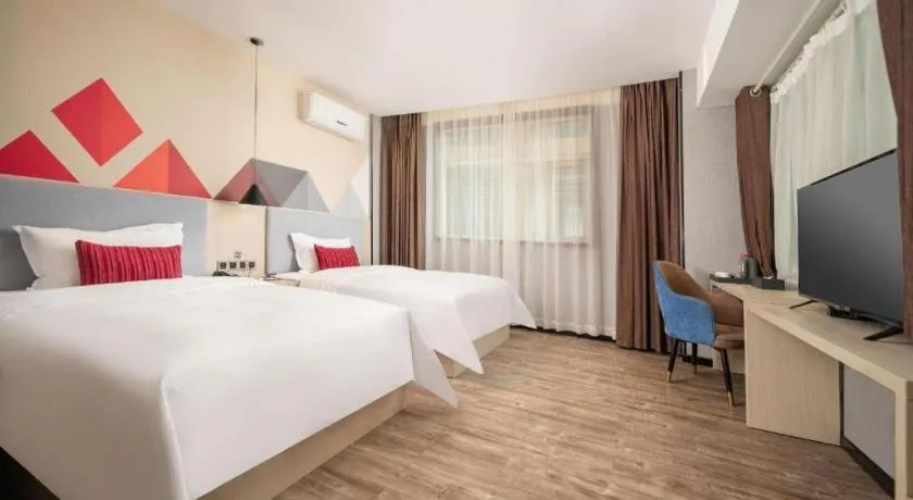 Bed in Borrman Hotel Dongguan Houjie Wanda Plaza Liaoxia Metro Station