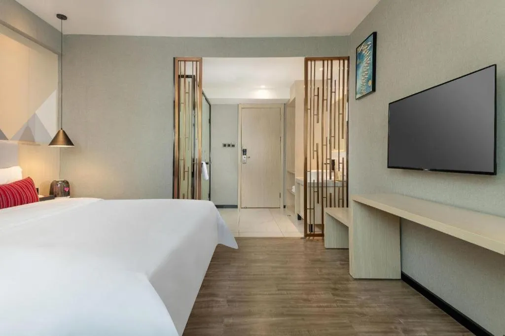 Bed in Borrman Hotel Dongguan Houjie Wanda Plaza Liaoxia Metro Station