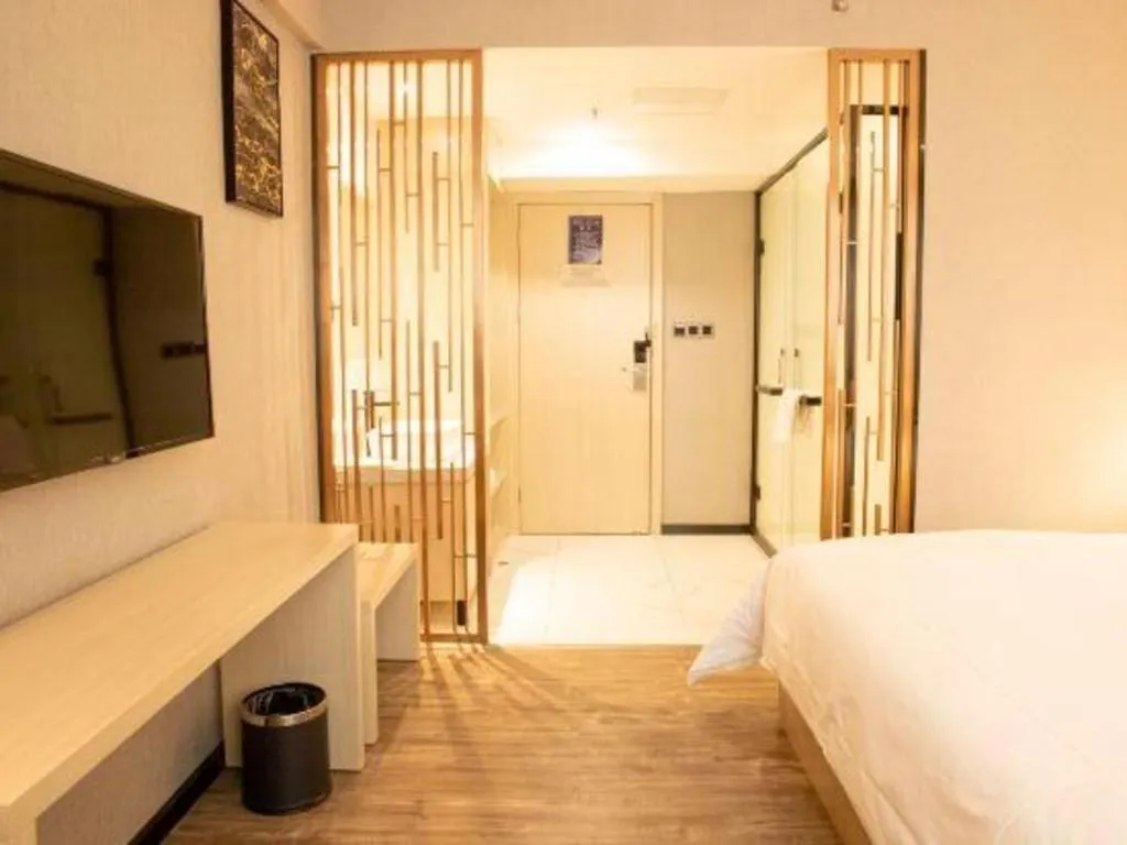 Bed in Borrman Hotel Dongguan Houjie Wanda Plaza Liaoxia Metro Station