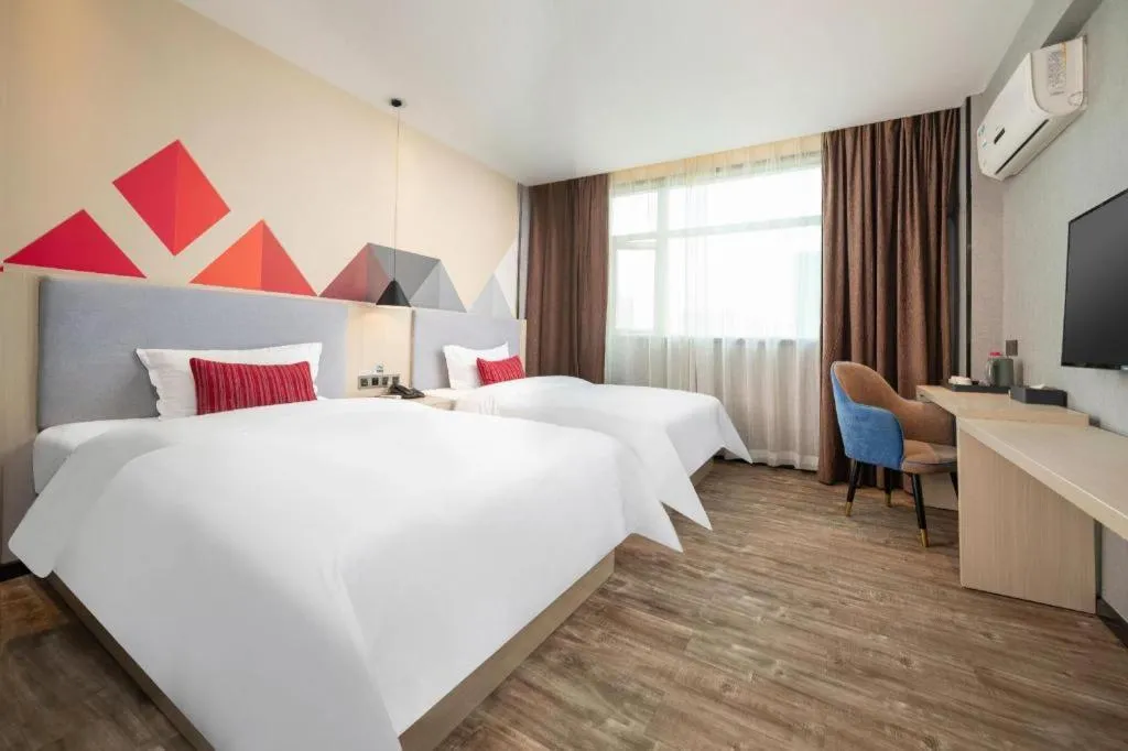 Bed in Borrman Hotel Dongguan Houjie Wanda Plaza Liaoxia Metro Station