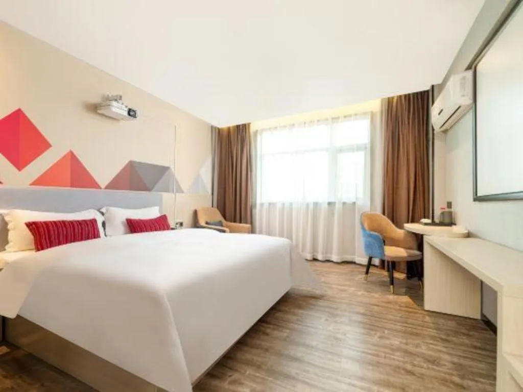 Bed in Borrman Hotel Dongguan Houjie Wanda Plaza Liaoxia Metro Station