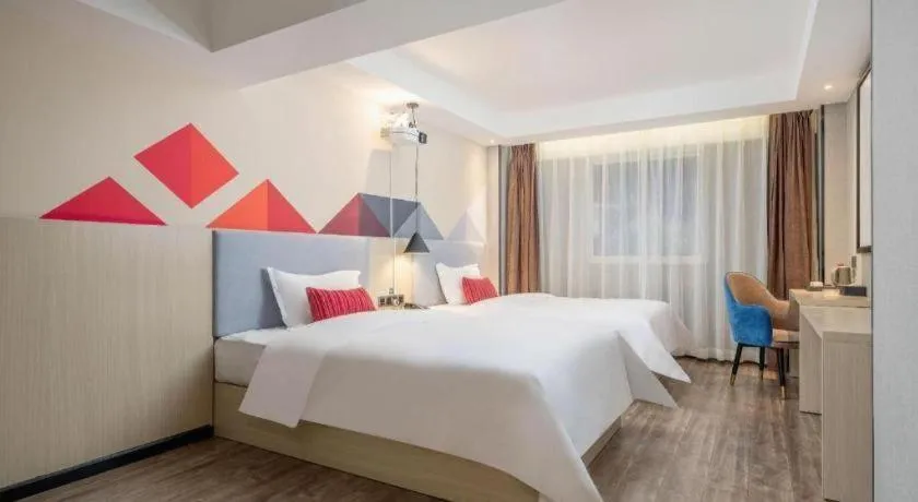 Bed in Borrman Hotel Dongguan Houjie Wanda Plaza Liaoxia Metro Station