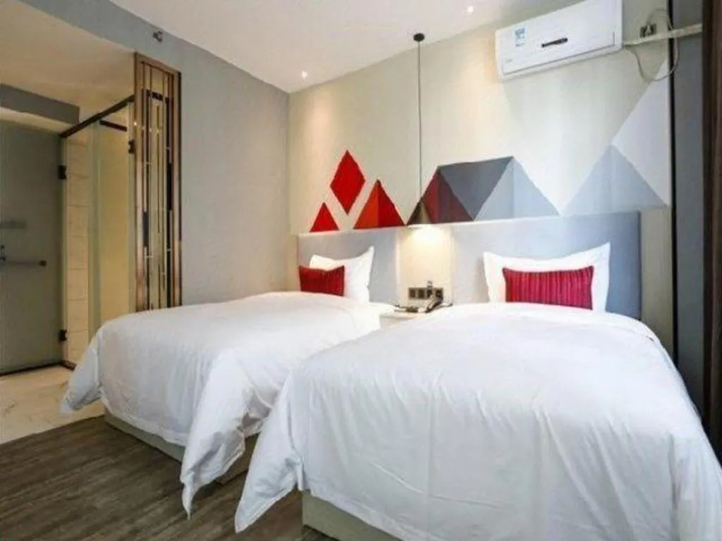 Bed in Borrman Hotel Dongguan Houjie Wanda Plaza Liaoxia Metro Station