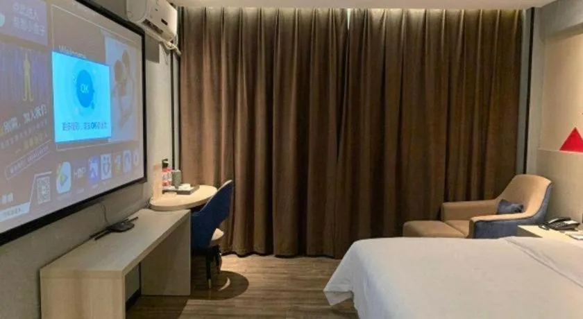 Bed in Borrman Hotel Dongguan Houjie Wanda Plaza Liaoxia Metro Station