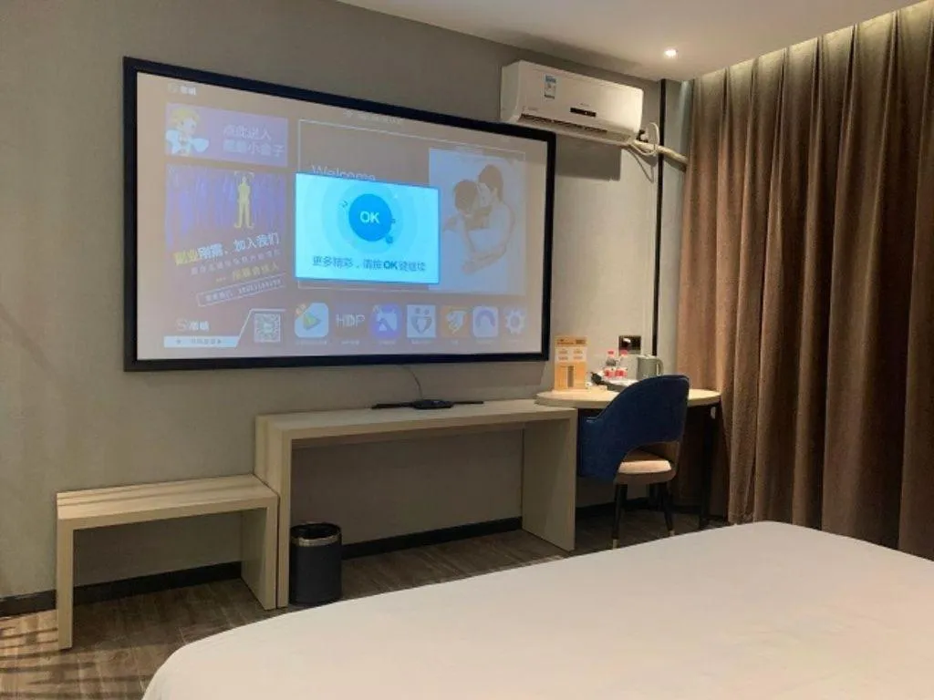 Bed in Borrman Hotel Dongguan Houjie Wanda Plaza Liaoxia Metro Station